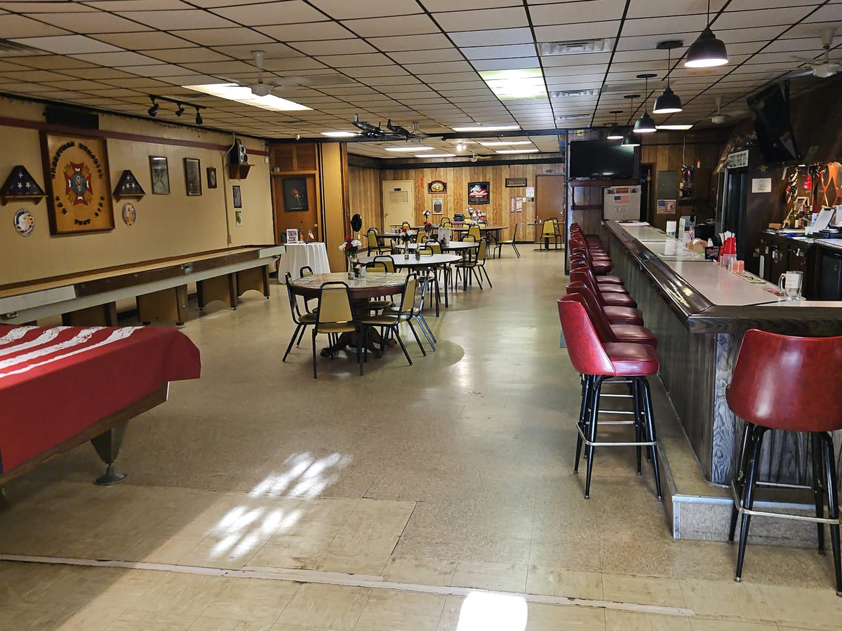 Actual VFW Post 3175 canteen, with bar seating and community tables